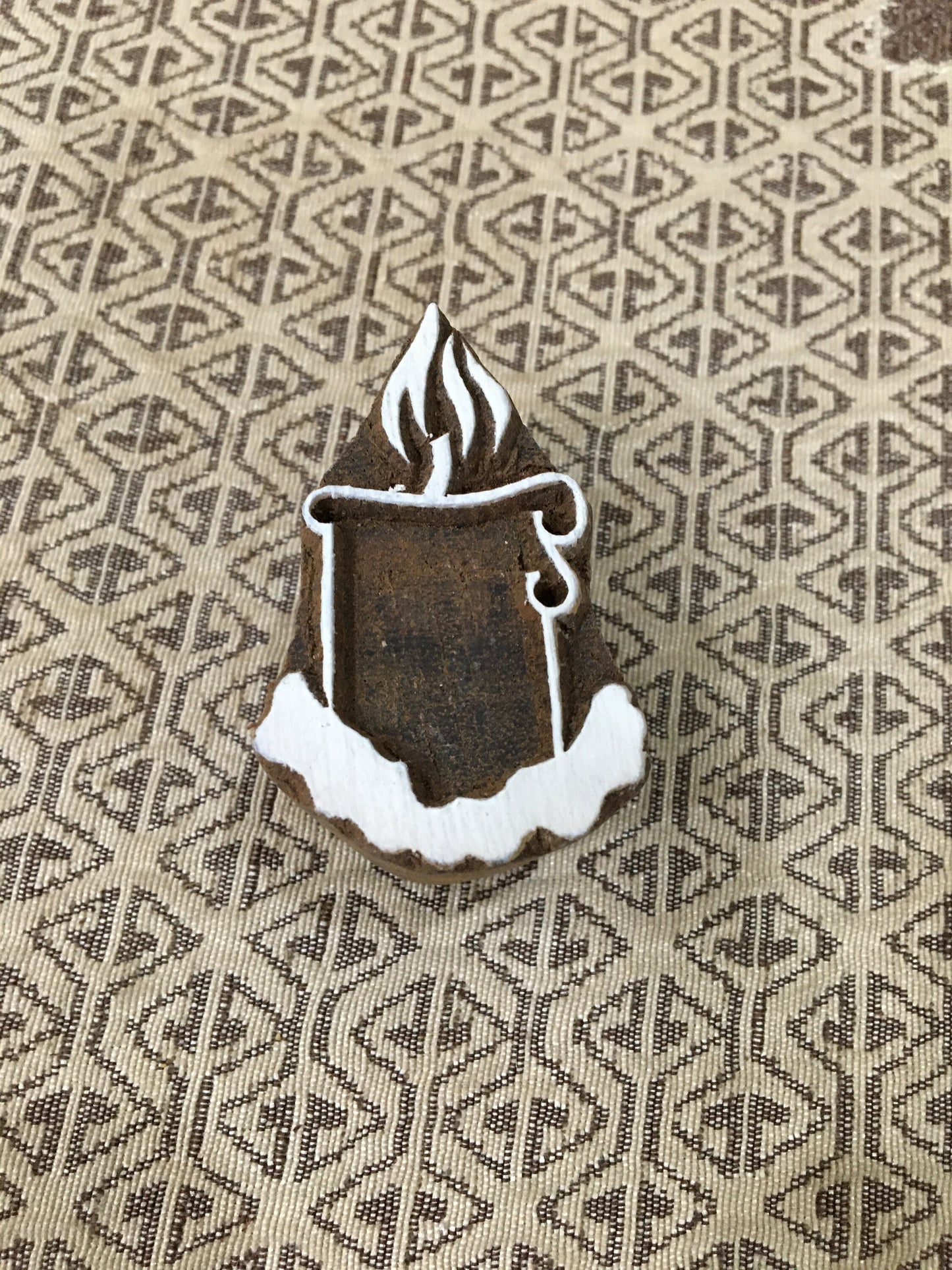 A lighted candle pottery stamp ceramic mold scrapbooking tjap batik printing floral carved stamps.