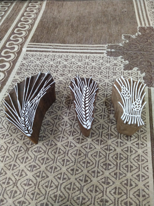 A  wheat hemp pottery stamp ceramic mould scrapbooking tjap batik printing floral carved stamps.