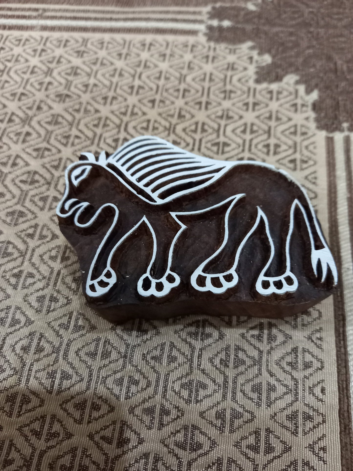 A Tribal Lion ,pottery stamp ceramic mold scrapbooking tjap batik printing floral carved stamps.