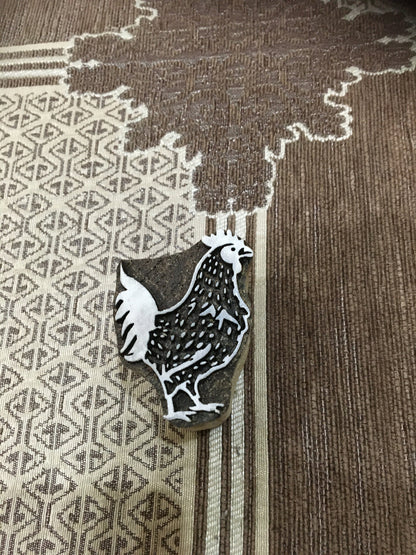 A rooster ,pottery stamp ceramic mould scrapbooking tjap batik printing floral carved stamps.