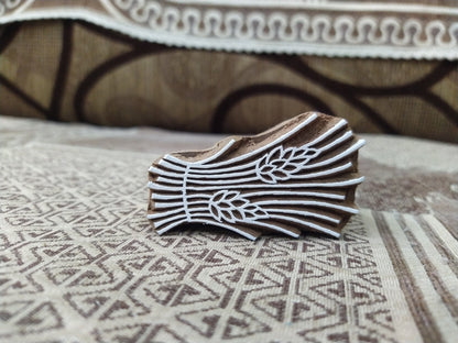 A  wheat hemp pottery stamp ceramic mould scrapbooking tjap batik printing floral carved stamps.