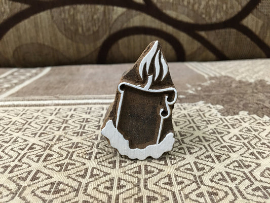 A lighted candle pottery stamp ceramic mold scrapbooking tjap batik printing floral carved stamps.